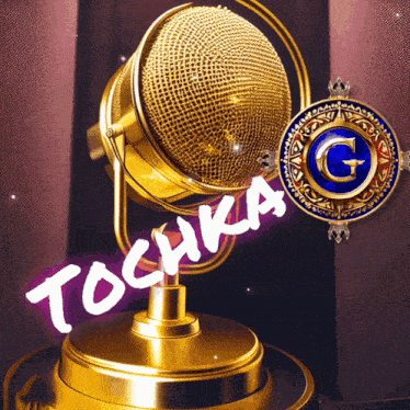 a gold microphone with tochka written on the bottom