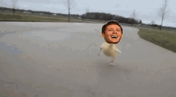 a man 's head is floating in the air while a dog runs behind him .