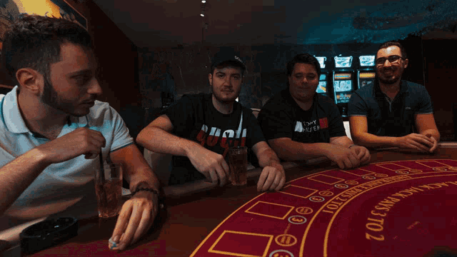 a group of men playing a game of blackjack