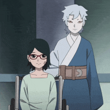 a girl in a wheelchair stands next to a boy in a kimono