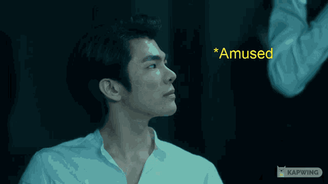 a man with his eyes closed and the word amused in yellow behind him
