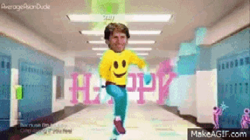 a man in a yellow shirt with a smiley face on it is running down a hallway