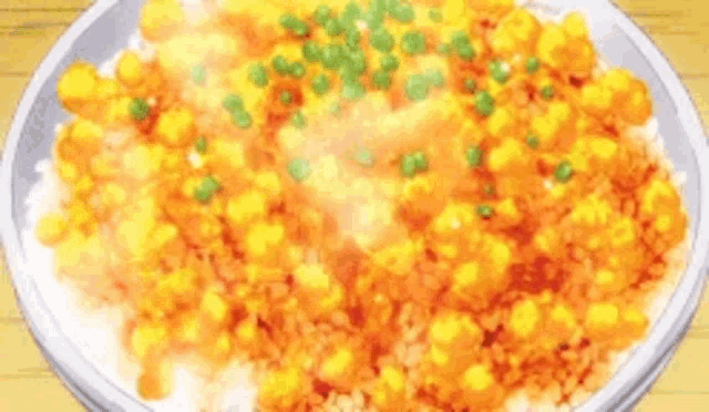 a close up of a plate of food with chopsticks on it .