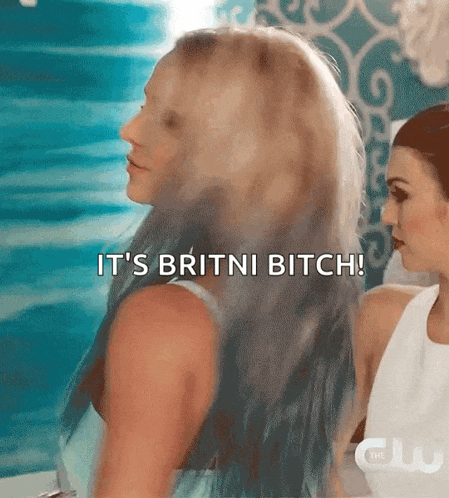 a woman says it 's britni bitch while another woman looks on