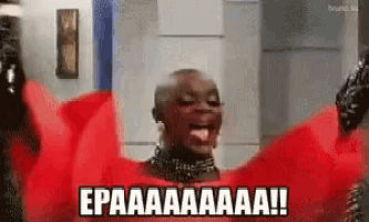 a woman in a red dress is screaming and saying epaaaaaaa !!