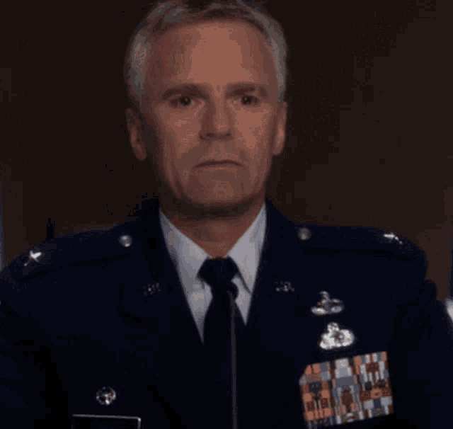 a man in a military uniform has the letters u.s.a. on his jacket