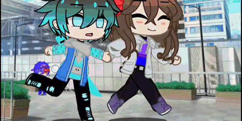 a boy and a girl are holding hands while walking down a sidewalk .