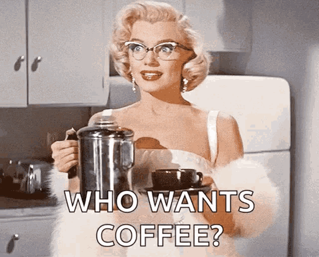 a woman in glasses is holding a coffee pot and a cup of coffee with the caption who wants coffee ?