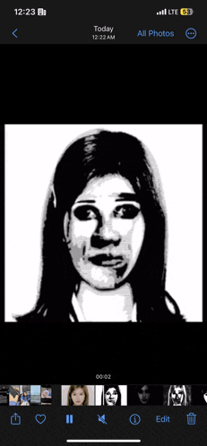 a phone screen shows a picture of a woman 's face and says today 12:22 am