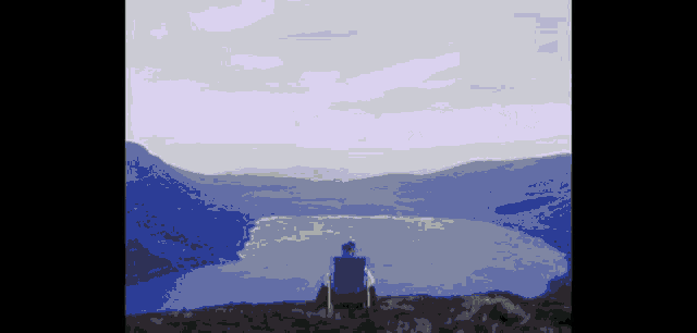 a pixelated image of a person sitting on top of a hill overlooking a lake