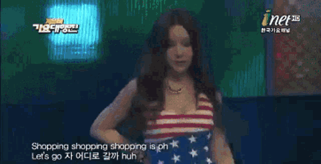 two women are dancing in front of a screen that says inet hd