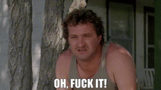 a man without a shirt is sitting in front of a tree with the words `` oh , fuck it ! ''