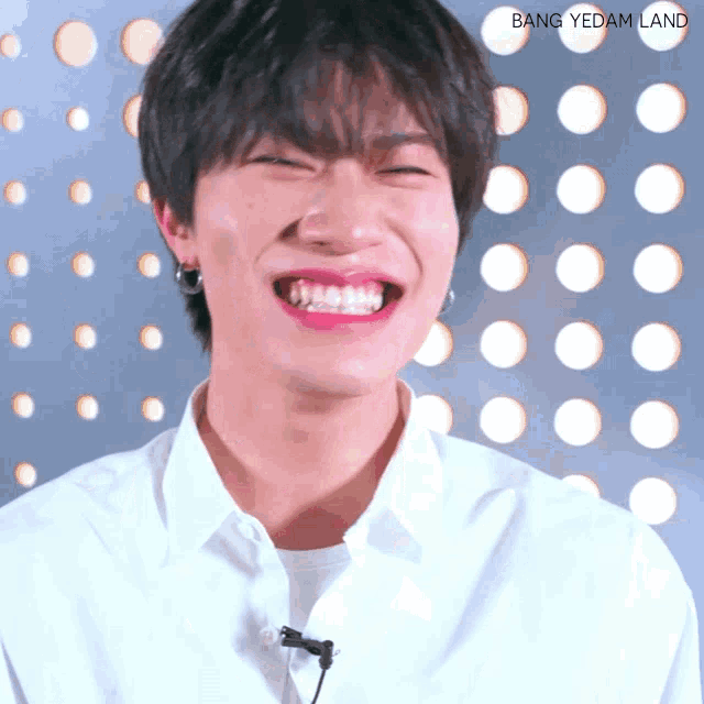 a close up of a person 's face with bang yedam land written on the bottom