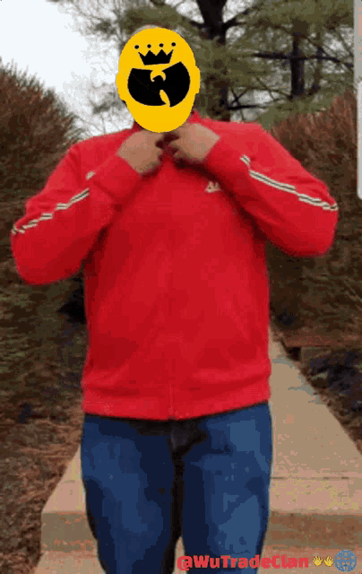 a man wearing a red jacket with a yellow wu tang symbol on his face