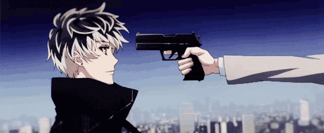 a person is pointing a gun at another person with a city in the background
