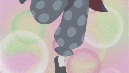 a cartoon character with polka dot pants and a pink background