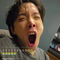 a man is yawning with his mouth open in a pixelated photo .
