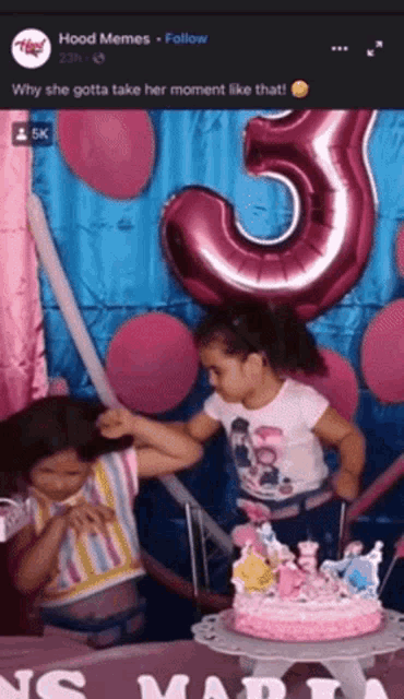 a little girl is celebrating her 5th birthday with a cake