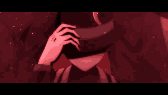 a person with red eyes and a black hat