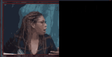 a woman with dreadlocks and glasses is making a funny face and the words `` i swear '' are behind her .
