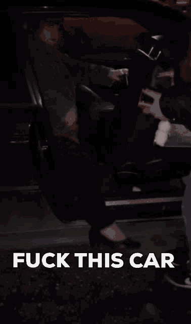 a picture of a person in a car with the words fuck this car below them