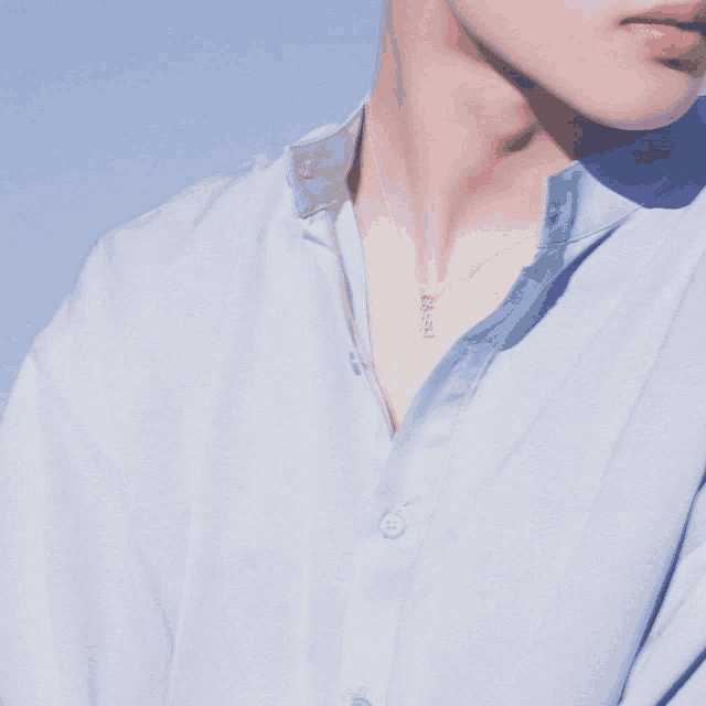 a close up of a person 's neck with a necklace that says ' ariel ' on it