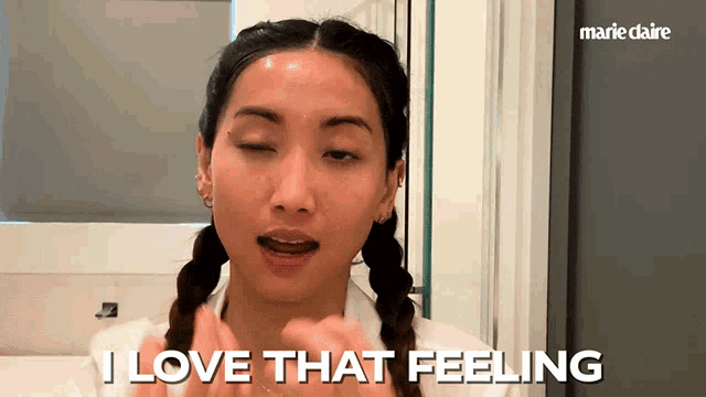 a woman says i love that feeling in front of a mirror