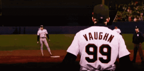 a baseball player wearing a number 99 jersey