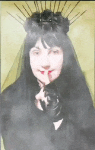 a woman wearing a black veil and gloves is making a shhh sign