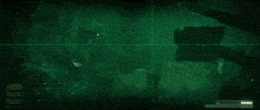 a glowing light is shining through a dark cave