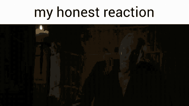 a man in a dark room with a candle in the background and the words my honest reaction above him