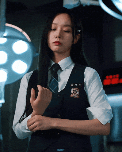 a girl in a school uniform has a badge on her chest that says seoul