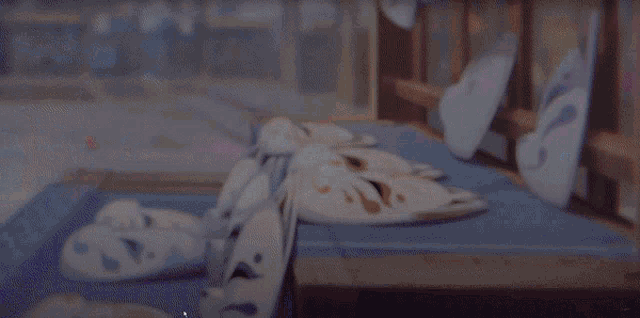 a bunch of masks are laying on the floor