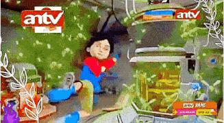 a cartoon character is sitting in front of an antv sign