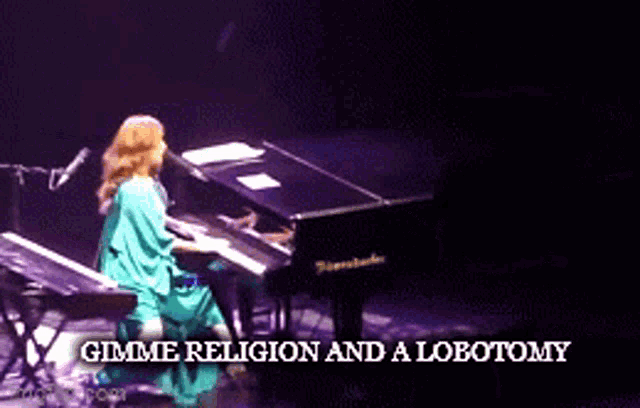 a woman playing a piano with the words gimme religion and a lobotomy written below her