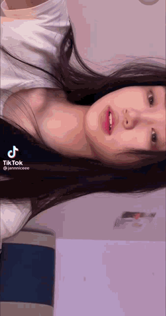 a tik tok video of a woman with long hair