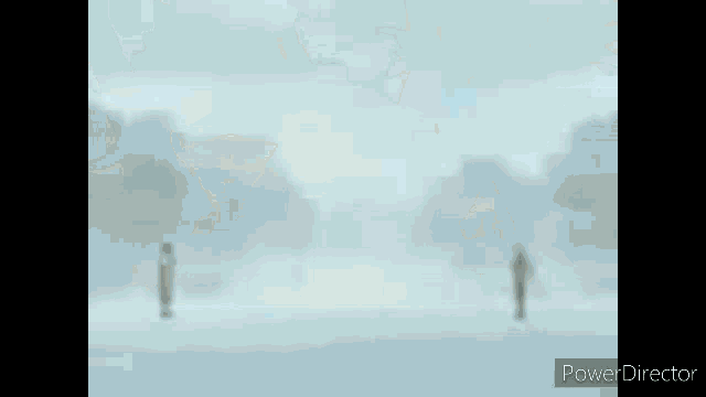 a blurry picture of a helicopter flying through the air .