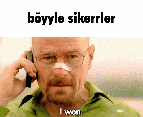 a man with glasses and a bandage on his nose talking on a cell phone