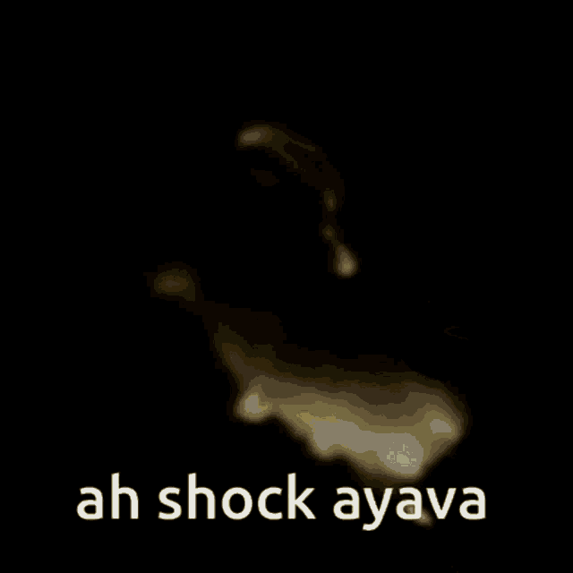a blurry picture of a man with the words ah shock ayava written on it