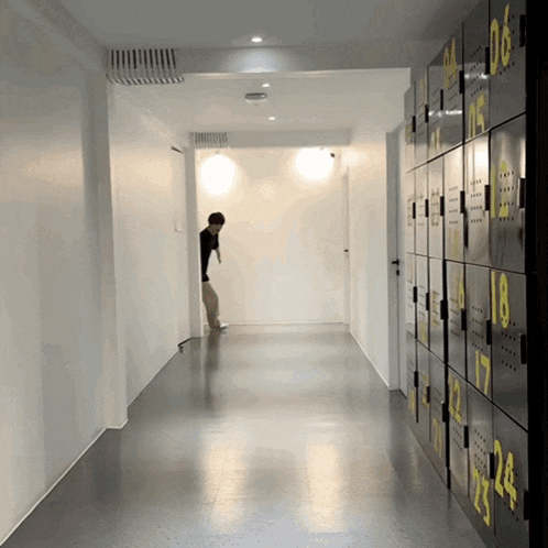 a row of lockers in a hallway with the numbers 1 through 24
