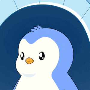a blue and white penguin with an orange beak is looking at the camera