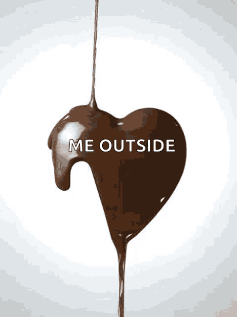 a melting chocolate heart with the words me outside on it