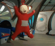 a red teletubbies character jumping in the air