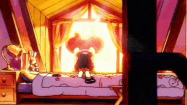 a girl is standing on a bed in front of a window