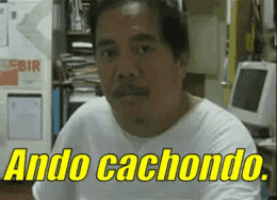 a man in a white shirt says ando cachondo in yellow letters