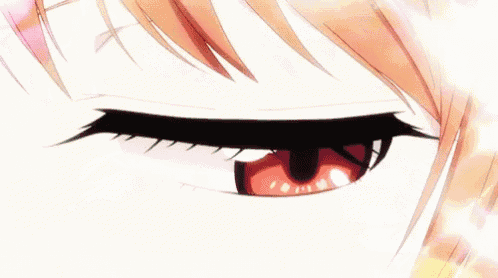 a girl with orange hair is yawning with her eyes closed and her tongue out .