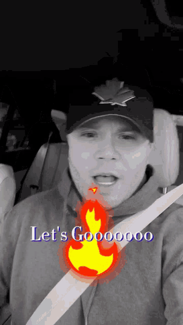 a man wearing a hat with a maple leaf on it says let 's gooooooo