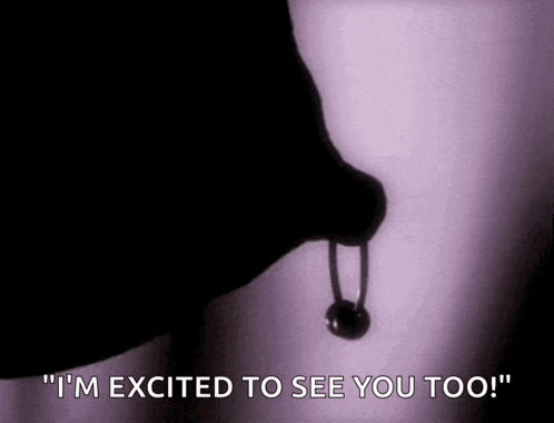 a silhouette of a person holding a bell in their mouth .