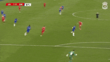 a soccer game between liverpool and chelsea with the score 1-0
