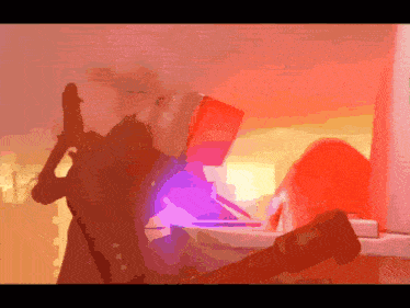 a person holding a gun with a box on their head